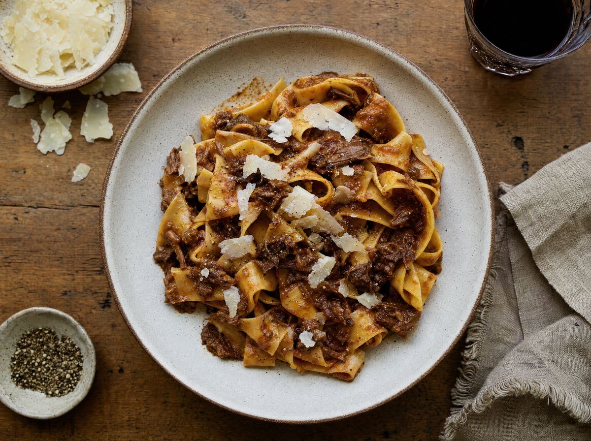 Pappardelle tossed with braised beef ragù, seen from above